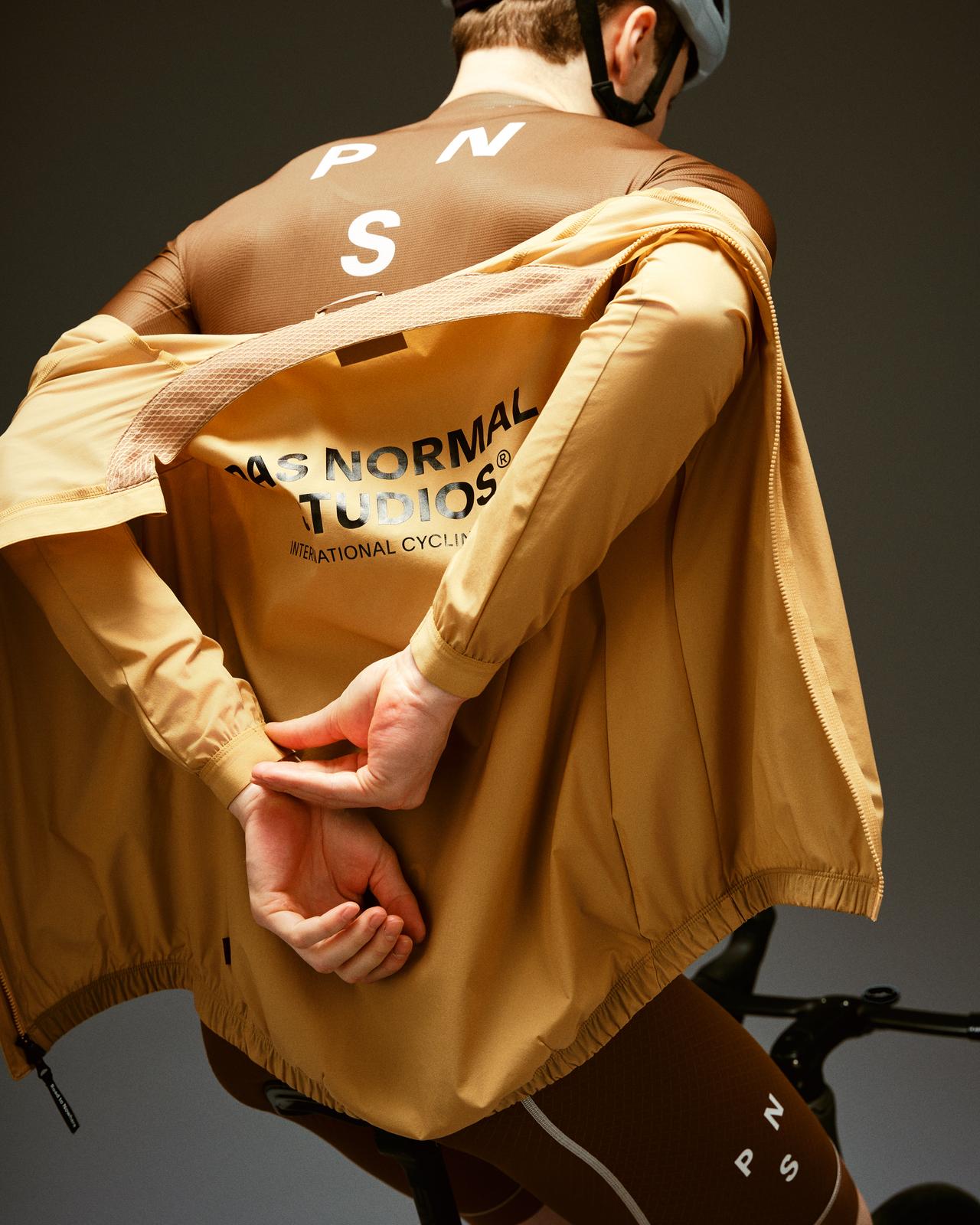 Pas Normal Studios - Men's Mechanism Stow Away Jacket - Camel - Nuremberg Germany - On model