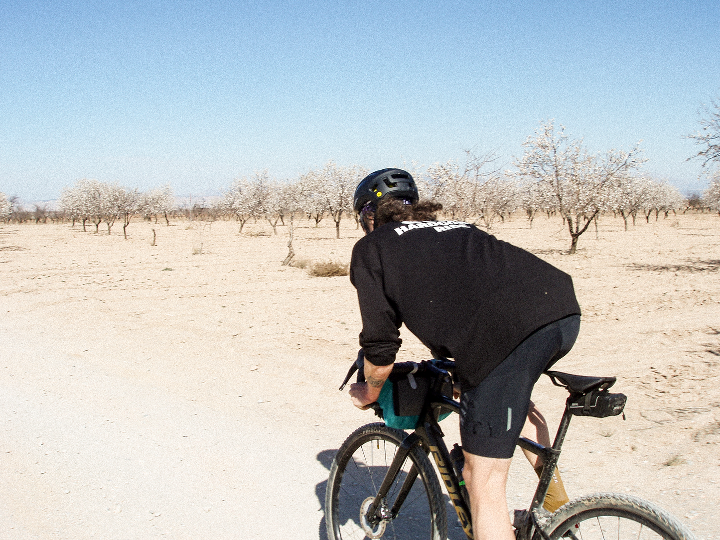 Holy Hardcore Ride Oversized Logo Long Sleeve Tee - Black - Nuremberg Germany - On bike in desert