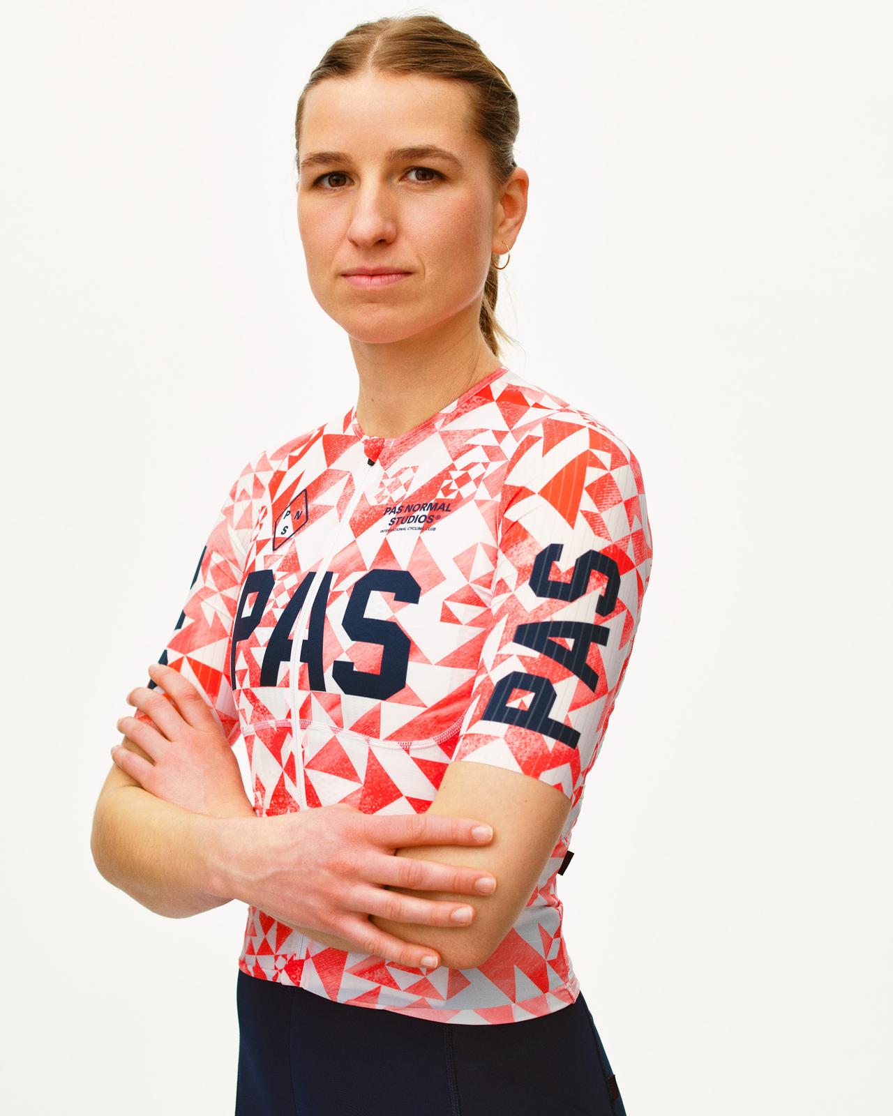 Pas Normal Studios - Women's PAS Mechanism Pro Jersey - PAS Origami - Nuremberg, Germany - On model arms crossed