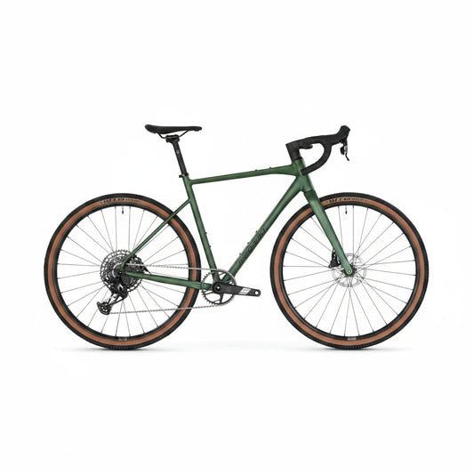 A green gravel bicycle with black handlebars, saddle, and drivetrain, featuring brown sidewall tires, shown from a side profile on a light gray background.