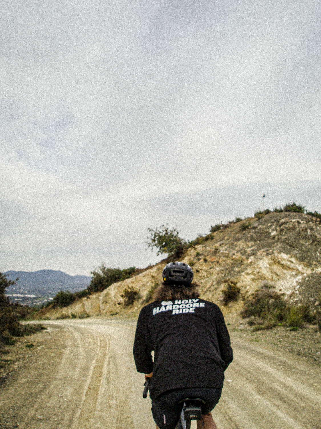 Holy Hardcore Ride Oversized Logo Long Sleeve Tee - Black - Nuremberg Germany - Back view on road